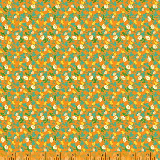 A calico fabric with small white flowers  with orange, blue and yellow accents, against an orange background