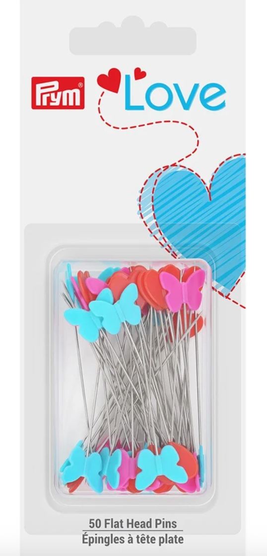 Pack of 50 flat head pins in a clear plastic blister pack on a white card backing. The pins have butterfly-shaped heads in pink, blue, and red, with silver metal wires.