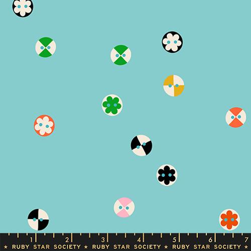 Pattern of colorful geometric shapes on a blue background with Ruby Star Society label at the bottom.