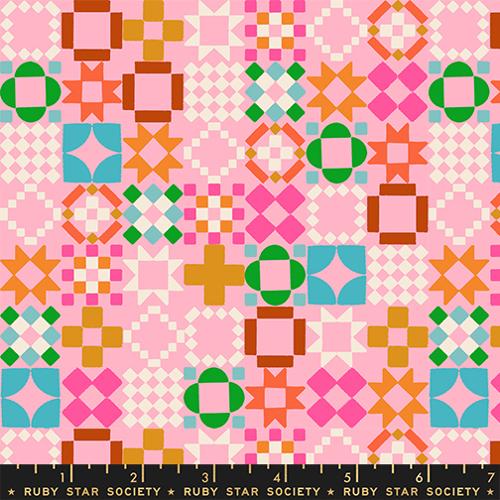 Colorful geometric pattern on a pink background with Ruby Star Society label.