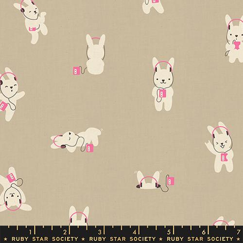 Fabric with cartoon rabbi wearing headphones on a beige background, featuring Ruby Star Society label
