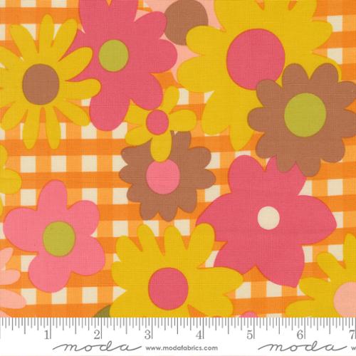 Pink, yellow, and brown flowers on an orange and white checked background
