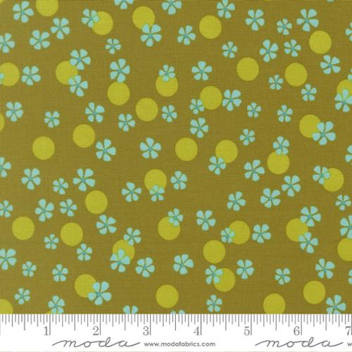 blue flowers and green dots on an olive green background with the Moda ruler below