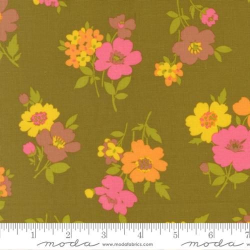 Pink, yellow, orange, and brown flowers with green stems on a green colored background with Moda ruler at the bottom
