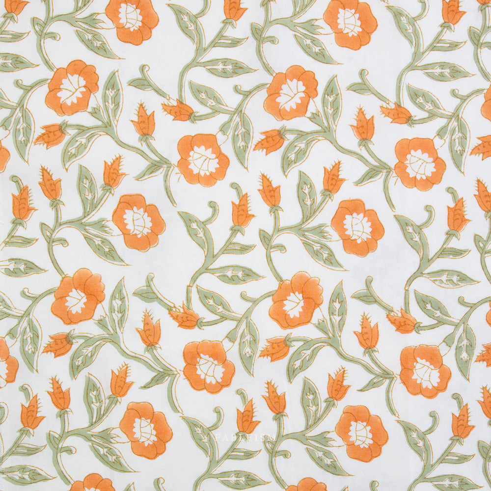 Pattern of orange flowers with green leaves on a light blue background