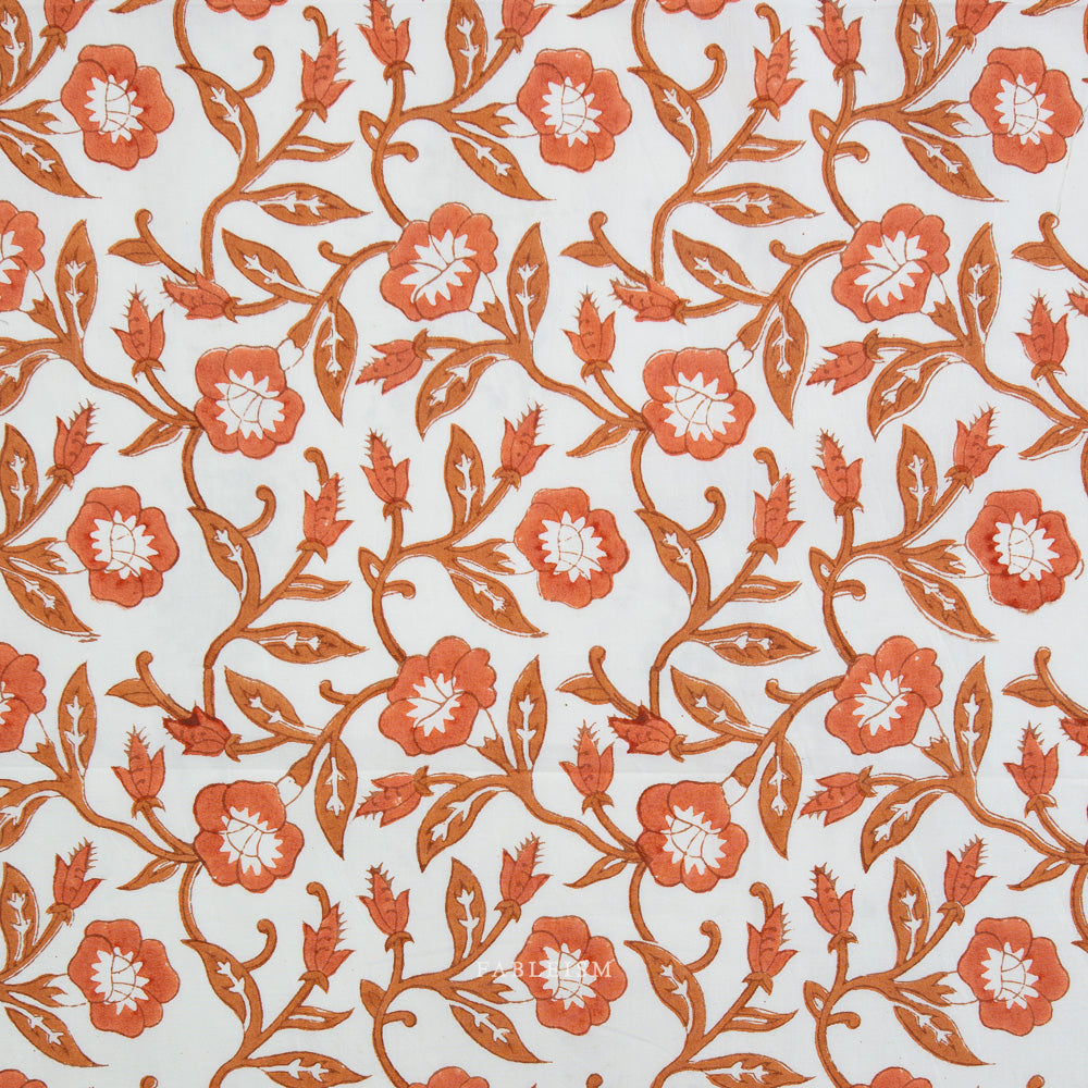 Pattern of red flowers and leaves on a white background