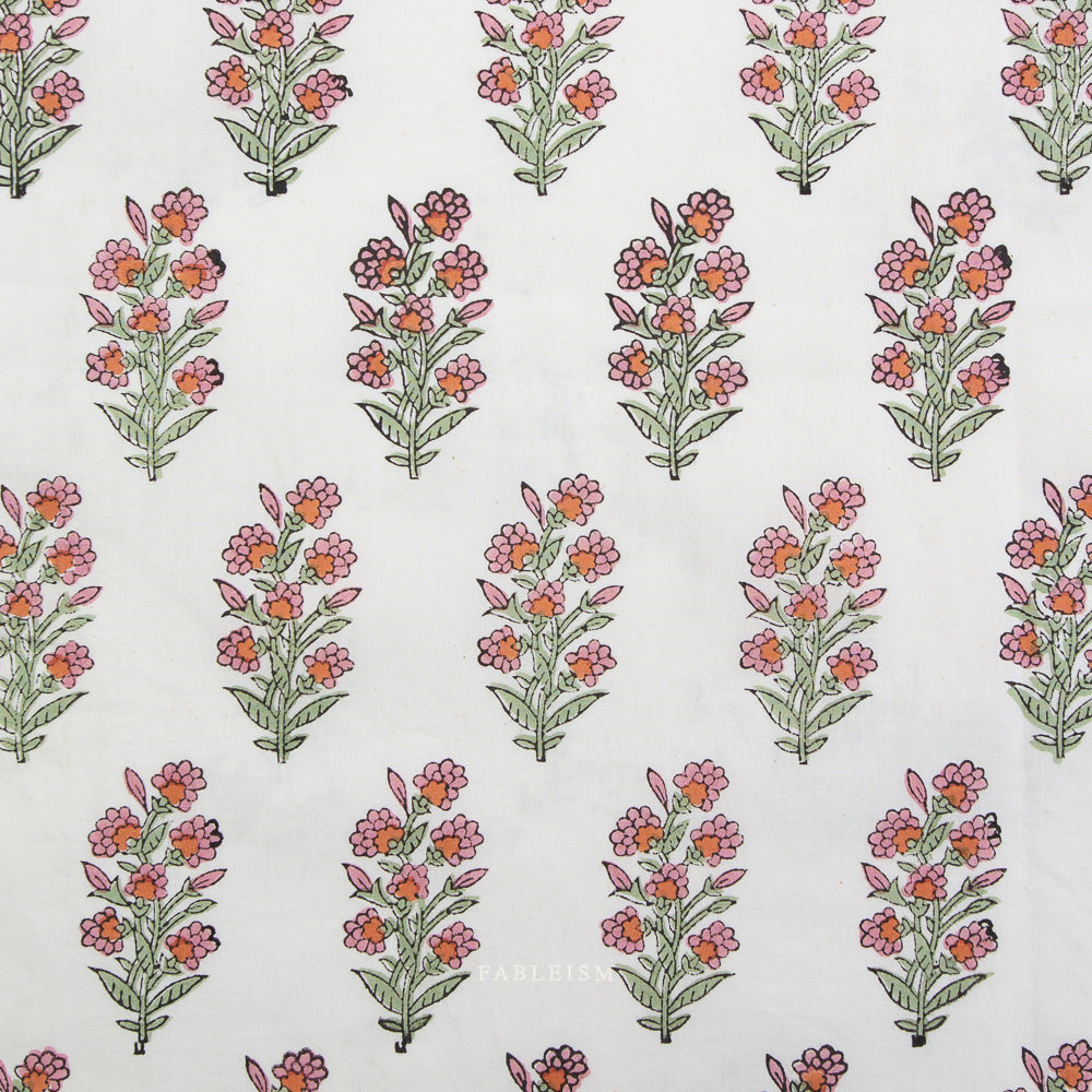 Pattern of stylized floral designs on a white background