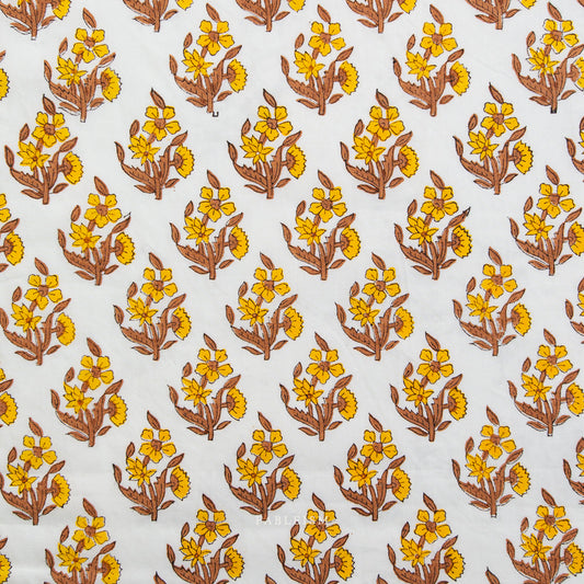 Pattern of yellow flowers with brown stems on a white background