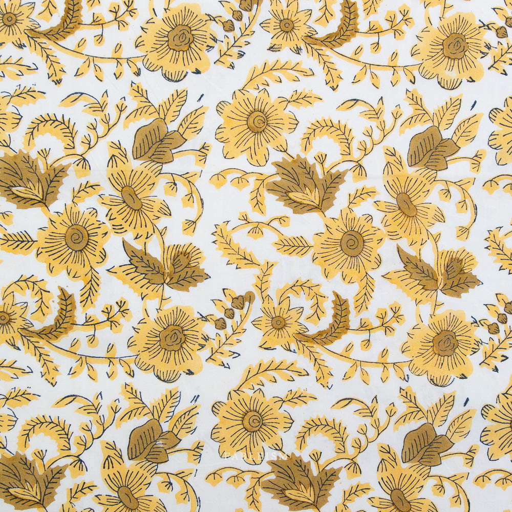 Pattern of yellow flowers and leaves on a white background