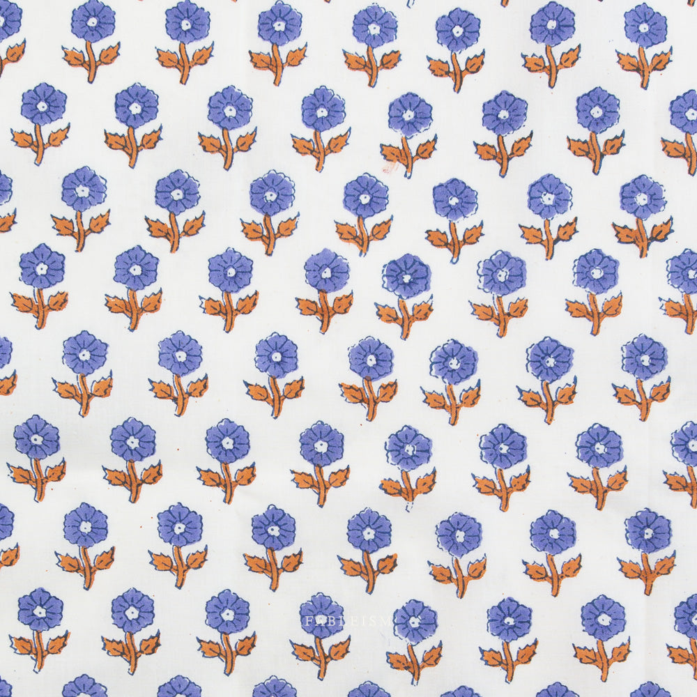 Pattern of blue flowers with brown stems on a white background