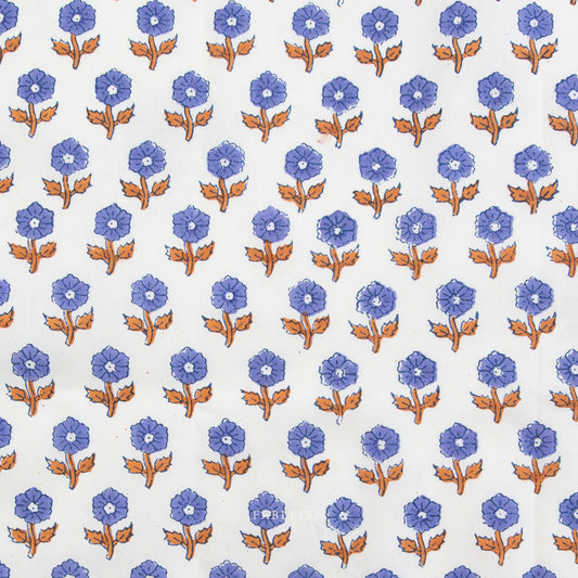 Pattern of blue flowers with brown stems on a white background