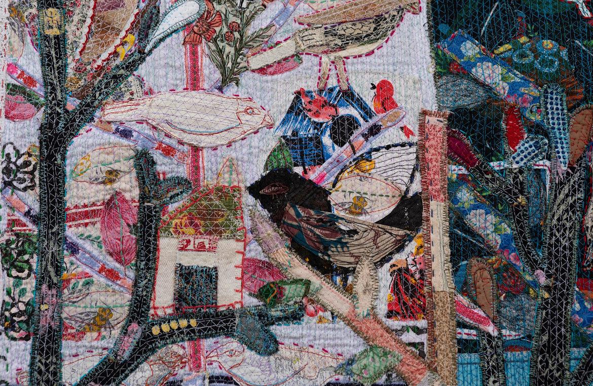 hand stitched folk art with birds