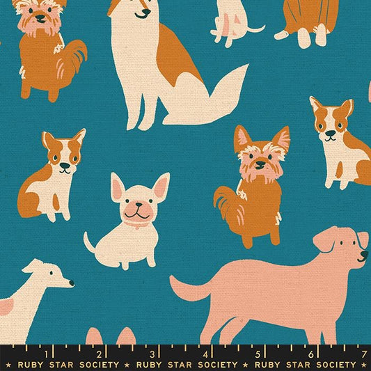 Detail of blue fabric with dog print
