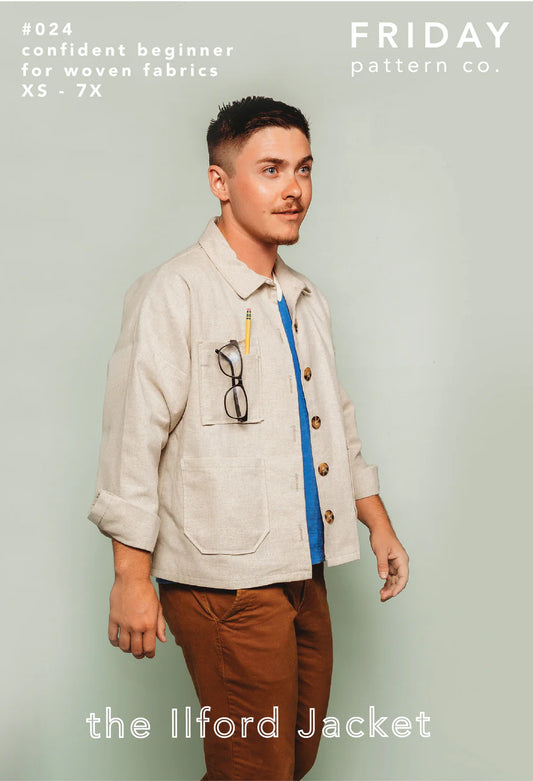Man wearing a light-colored jacket with a blue stripe, standing against a light green background. Advert for 'The Ilford Jacket' with text overlay.