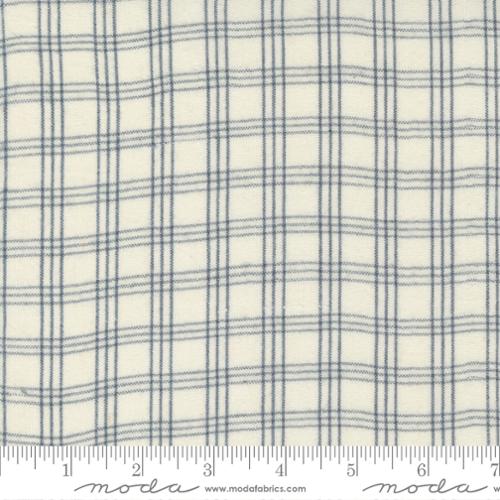 Blue plaid fabric pattern featuring Moda Fabrics branding.