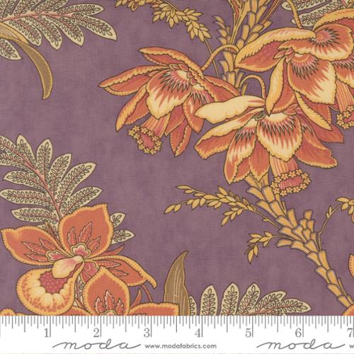 Floral fabric pattern with a ruler for scale on a purple background
