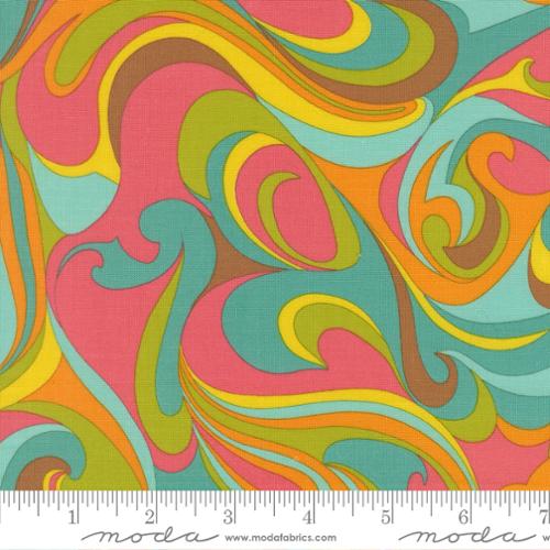Pink, green, blue, orange, brown and yellow swirled in an abstract pattern with a Moda ruler at the bottom