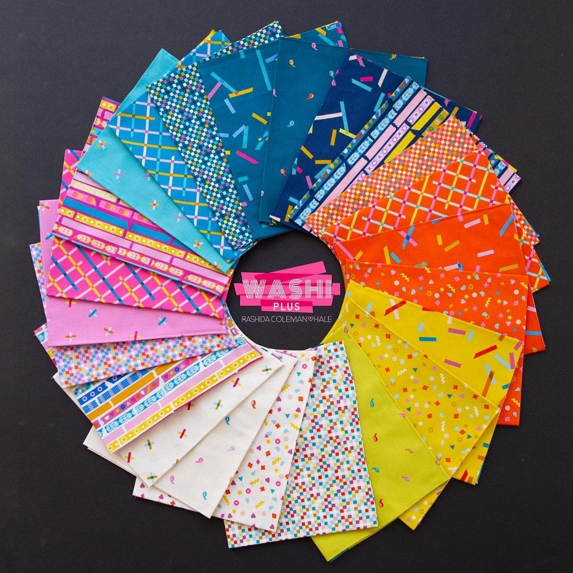 Collection of colorful patterned paper sheets arranged in a circular pattern on a black background, with 'Washi Plus' branding.